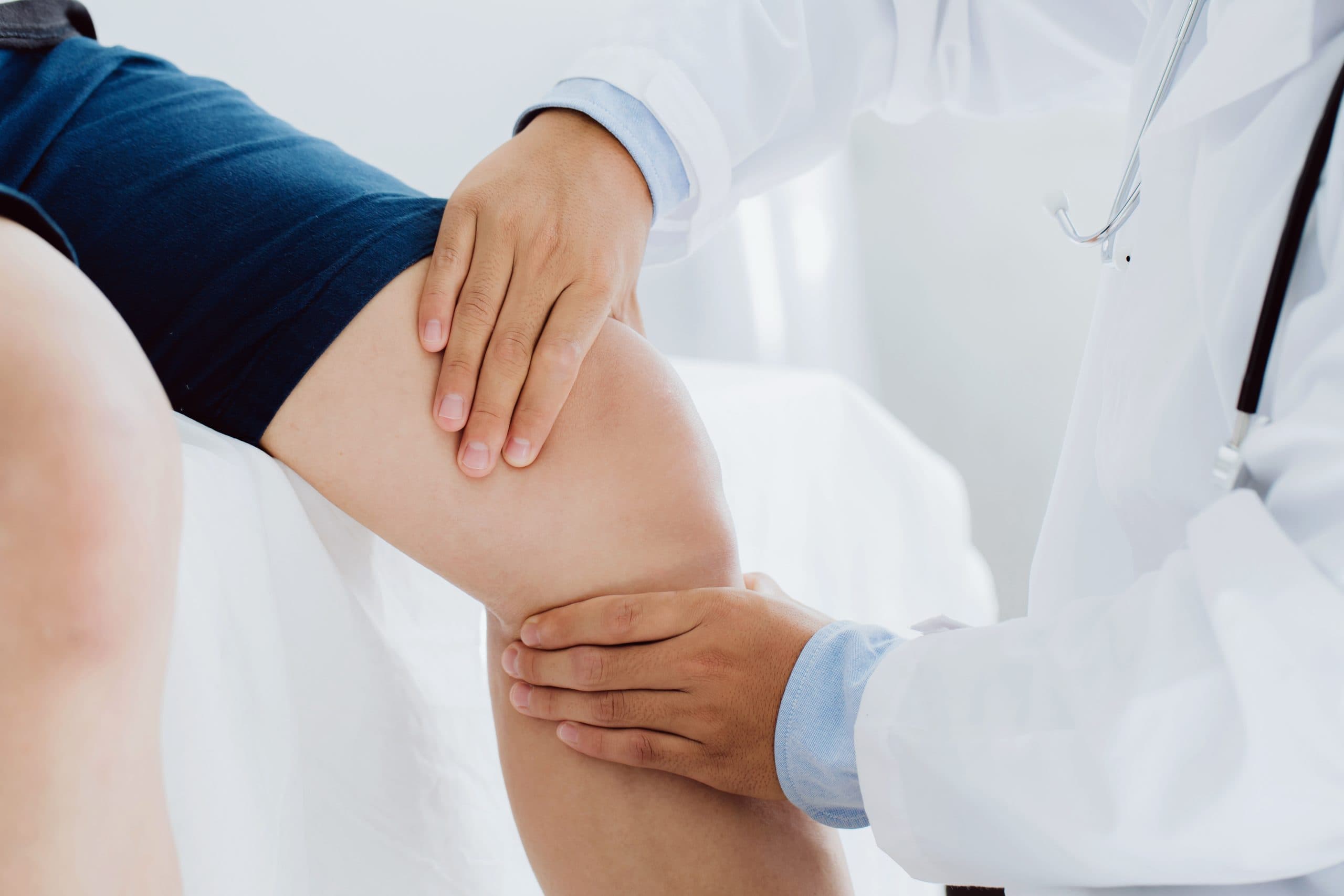 Close-up of gloved PRP-style knee injection